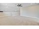 Bright bonus room with carpeted floors and ample natural light, perfect for a playroom or home office at 240 Lucca Dr, Summerville, SC 29486