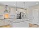 Close up of an island kitchen with stainless steel appliances at 240 Lucca Dr, Summerville, SC 29486