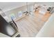 Open-concept living area with wood floors, abundant natural light, and modern finishes at 240 Lucca Dr, Summerville, SC 29486