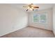 Bright bedroom with neutral walls, carpet, and large windows at 2425 Vistavia Rd, North Charleston, SC 29406
