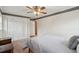 Bedroom with a bed, a closet, neutral walls, and traditional design elements at 2425 Vistavia Rd, North Charleston, SC 29406
