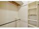 Walk-in closet with built-in shelving and hanging rods at 2425 Vistavia Rd, North Charleston, SC 29406