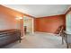 Spacious living room with dark wood furniture and warm colored walls at 2425 Vistavia Rd, North Charleston, SC 29406