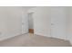 This bedroom features carpet, white walls and trim, and two closets with doors at 2831 Chicopee Dr, North Charleston, SC 29420
