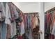 An organized walk-in closet holds plenty of clothing items and shoes, providing ample storage space at 2831 Chicopee Dr, North Charleston, SC 29420