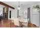 Elegant dining area with modern decor, hardwood floors, and access to the backyard at 2831 Chicopee Dr, North Charleston, SC 29420