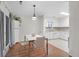 Inviting dining area next to a white kitchen featuring lots of natural light at 2831 Chicopee Dr, North Charleston, SC 29420