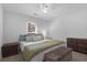 Comfortable main bedroom with a ceiling fan, carpet, neutral walls, and wood furniture at 2831 Chicopee Dr, North Charleston, SC 29420