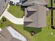 Aerial view showcasing the home's roof, driveway, backyard with a playground, and surrounding landscape at 2889 Backman St, Mount Pleasant, SC 29466