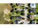 A vacant lot is surrounded by lush greenery and established neighborhood homes with a marsh view at 3095 S Shore Dr, Charleston, SC 29407