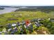 Aerial view of waterfront homes surrounded by scenic marshland and lush greenery at 3095 S Shore Dr, Charleston, SC 29407