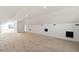 Bright, spacious attic with plush carpeting, recessed lighting, and a view to the exterior at 3095 S Shore Dr, Charleston, SC 29407