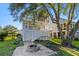 This backyard features a fire pit, a lush lawn, and access to elevated porches at 3095 S Shore Dr, Charleston, SC 29407