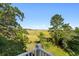 This home boasts scenic marsh views from a private elevated porch at 3095 S Shore Dr, Charleston, SC 29407