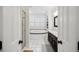 Elegant bathroom featuring a soaking tub, dual vanity, and modern fixtures at 3221 Johnstowne St, Johns Island, SC 29455