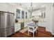 Beautiful kitchen with stainless steel appliances, island, and hardwood floors at 3221 Johnstowne St, Johns Island, SC 29455