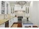 Gourmet kitchen with stone countertops, stainless steel appliances, and custom cabinetry at 3221 Johnstowne St, Johns Island, SC 29455