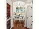 Bright, open kitchen with island, chandelier, and modern appliances at 3221 Johnstowne St, Johns Island, SC 29455