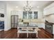 Charming kitchen featuring white cabinets, an island, and stainless steel appliances at 3221 Johnstowne St, Johns Island, SC 29455