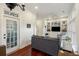 Inviting living room with modern furnishings and access to outdoor patio at 3221 Johnstowne St, Johns Island, SC 29455