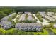 Aerial view of residential townhome community showcasing manicured lawns and mature trees at 3616 Bagley Dr, Mount Pleasant, SC 29466