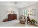 Bedroom with neutral carpet, plantation shutters, and a ceiling fan at 3616 Bagley Dr, Mount Pleasant, SC 29466