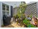 Charming outdoor deck with vibrant flowers and decorative planters, perfect for relaxing at 3616 Bagley Dr, Mount Pleasant, SC 29466