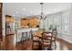 Dining area with wood table, seating for four, and hardwood floors at 3616 Bagley Dr, Mount Pleasant, SC 29466