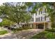 Attractive townhomes with brick accents, lush landscaping, and private driveways offer curb appeal at 3616 Bagley Dr, Mount Pleasant, SC 29466