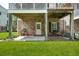 View of the exterior of the home, patios, yard, and brick foundation at 3616 Bagley Dr, Mount Pleasant, SC 29466
