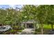 Charming home with a well-manicured lawn, mature trees, and a spacious driveway leading to a garage at 3616 Bagley Dr, Mount Pleasant, SC 29466
