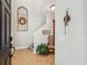 Inviting foyer with neutral walls, tile flooring, staircase, and tasteful decor at 3616 Bagley Dr, Mount Pleasant, SC 29466