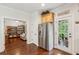 Kitchen with stainless steel refrigerator and doorway leading to an outdoor screened patio at 3616 Bagley Dr, Mount Pleasant, SC 29466