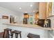 Kitchen bar with seating and granite countertops at 3616 Bagley Dr, Mount Pleasant, SC 29466
