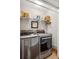 Laundry area featuring front load washer and dryer and shelving with baskets and supplies at 3616 Bagley Dr, Mount Pleasant, SC 29466