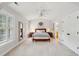 Bedroom features vaulted ceilings, neutral carpet, and lots of natural light at 3616 Bagley Dr, Mount Pleasant, SC 29466