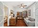 Cozy home office featuring hardwood floors, a bookshelf, and a comfortable sitting area at 3616 Bagley Dr, Mount Pleasant, SC 29466