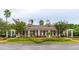 Charming pool house with brick facade and well-manicured landscaping at 3616 Bagley Dr, Mount Pleasant, SC 29466