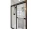 Modern walk-in shower features a full glass door, multiple shower heads, and built-in shelving at 3616 Bagley Dr, Mount Pleasant, SC 29466