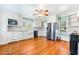 Spacious kitchen features stainless steel appliances, granite countertops, and ample cabinet space at 406 S Gum St, Summerville, SC 29483
