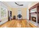 Office with wood floors, fireplace and large windows providing natural light at 406 S Gum St, Summerville, SC 29483