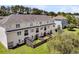 Aerial view of townhomes with fenced backyards and mature trees at 4060 Hartland St, Charleston, SC 29414