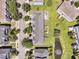 Birds eye view of homes with well-manicured lawns near a community pond at 4060 Hartland St, Charleston, SC 29414