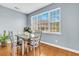 Comfortable dining area with hardwood floors and a view of the outdoors at 4060 Hartland St, Charleston, SC 29414
