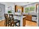 Stylish eat-in kitchen with barstool seating and stainless steel appliances at 4060 Hartland St, Charleston, SC 29414