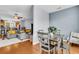Open-concept living area with a gray sofa and an adjacent dining area at 4060 Hartland St, Charleston, SC 29414