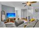 Open-concept living room with modern furnishings, hardwood floors, and a welcoming atmosphere at 4060 Hartland St, Charleston, SC 29414