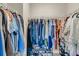 Spacious walk-in closet with ample hanging space, shelving and shoe racks for organized storage at 4060 Hartland St, Charleston, SC 29414