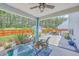Spacious backyard patio with lush greenery, grill, and comfortable seating area at 4314 Cotton Flat Rd, Summerville, SC 29485