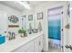 Modern bathroom with a double vanity, sleek mirrors, and a combination of decor and fixtures at 4314 Cotton Flat Rd, Summerville, SC 29485